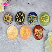 a set of stones with different symbols on them